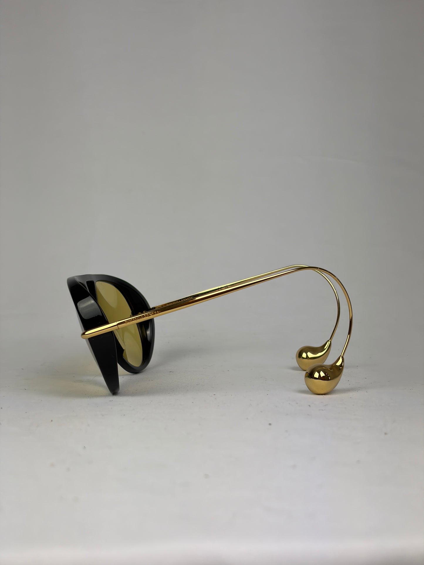 Bottega Veneta Aviator Sunglasses in Black and Gold with Yellow Lenses