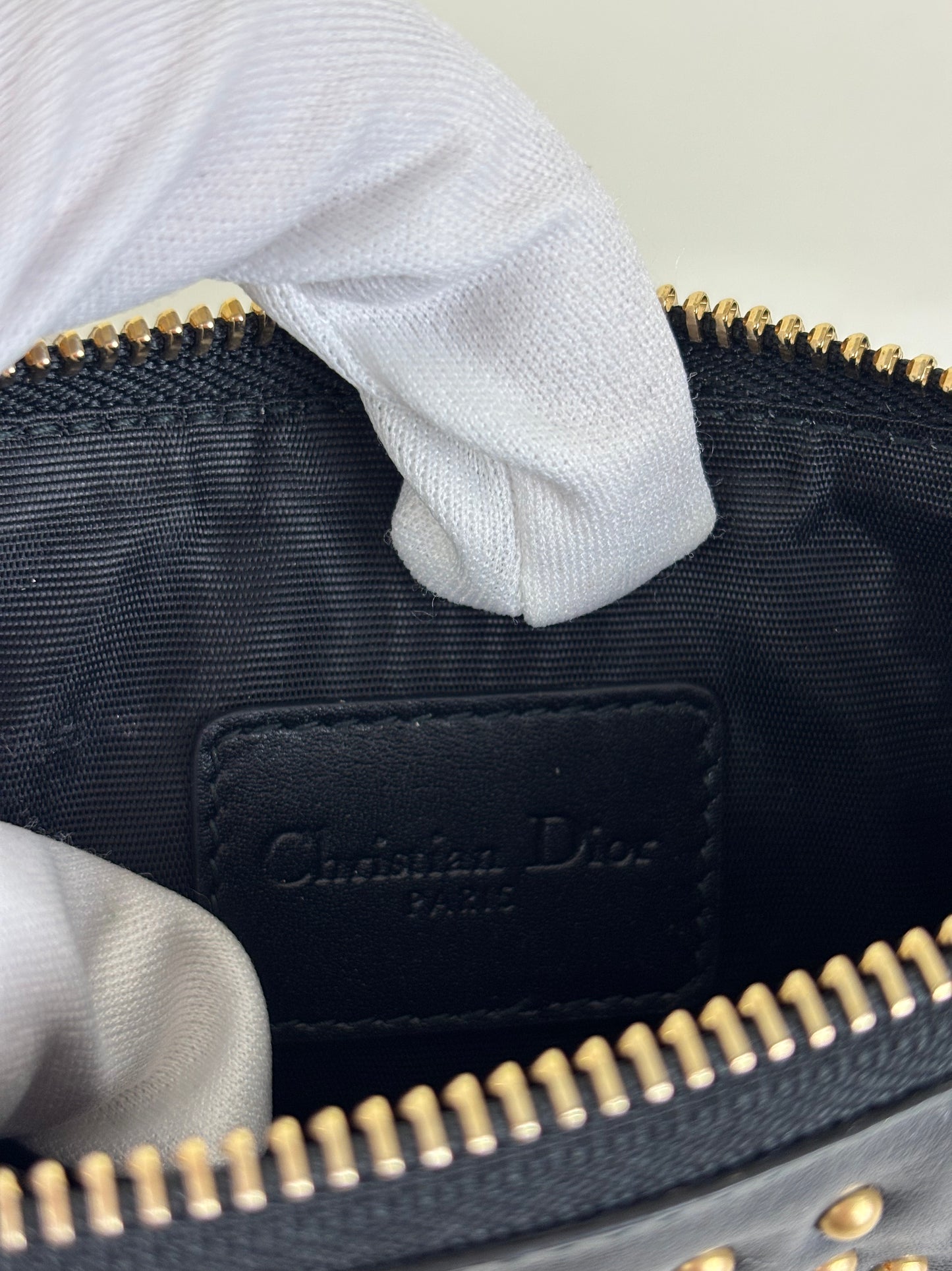 Christian Dior studded charm pouch