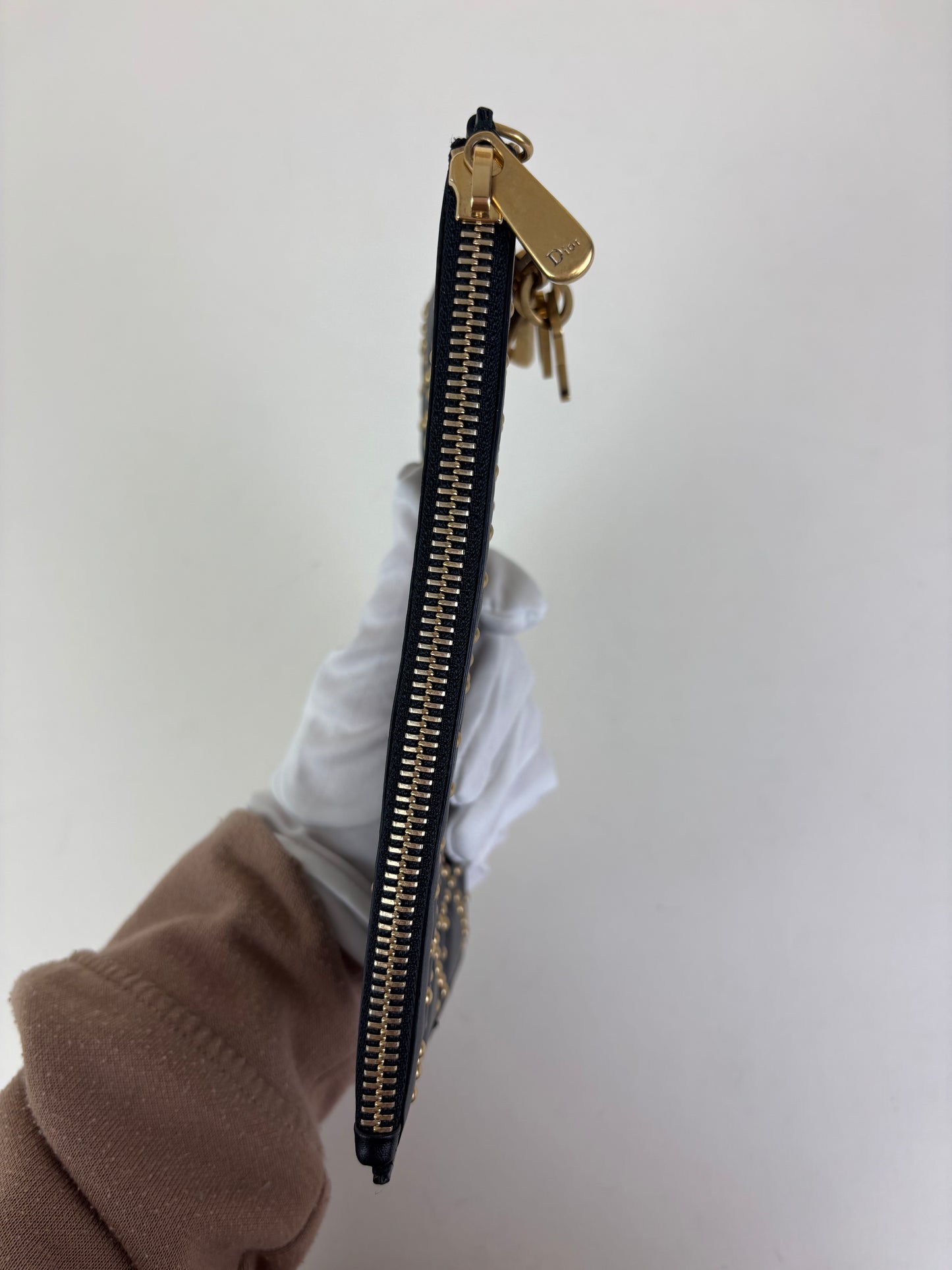 Christian Dior studded charm pouch
