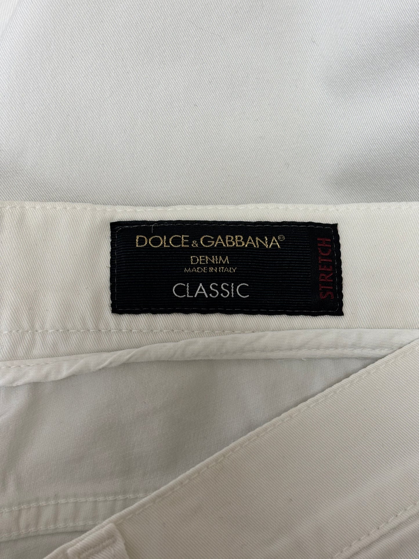 Dolce & Gabbana denim label on a white fabric background